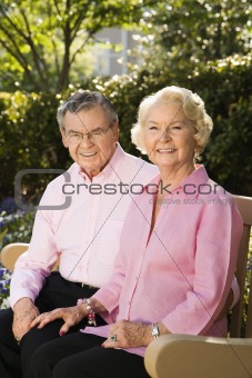 Mature couple on bench.