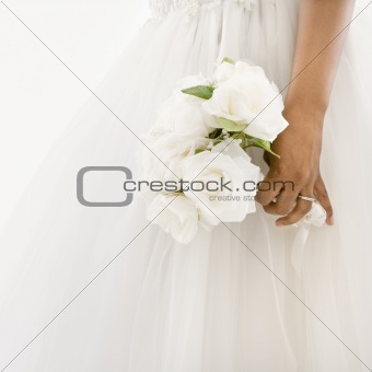 Bride holding bouquet.