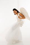 Angelic bride on swing.