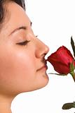Lady smelling rose