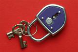 a blue padlock with keys on red