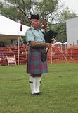 A Scot Playing Pipes