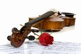 Violin, rose and sheet music