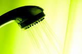 backlit showerhead with green background