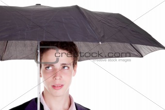 Young boy with an umbrella, isolated on white, studio shot