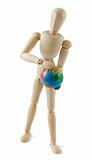 Wooden mannequin with a globe in hands