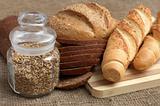 Bread, baguette and pot with grains