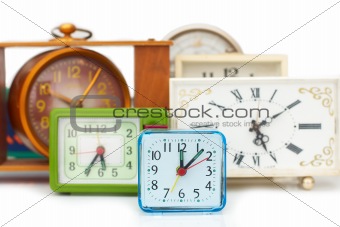 Many old clocks with different time