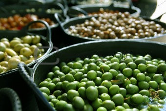 olives in pickling brine background texture