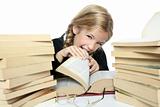 little blond student girl eating her books