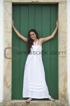 White dress, green door.