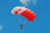 The parachutist under a pink parachute 