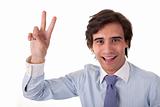 Young bussiness man with arm raised in victory sign