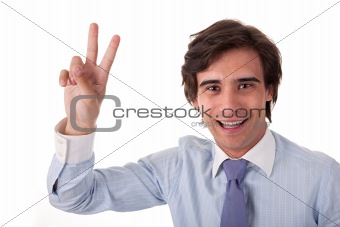 Young bussiness man with arm raised in victory sign