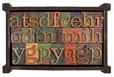 alphabet in rusti wooden box