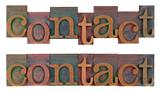 contact - old wooden letterpress type