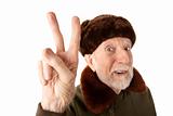 Russian Man in Fur Cap Making Peace Sign