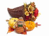 Cornucopia of flowers with pumpkins and scarecrow