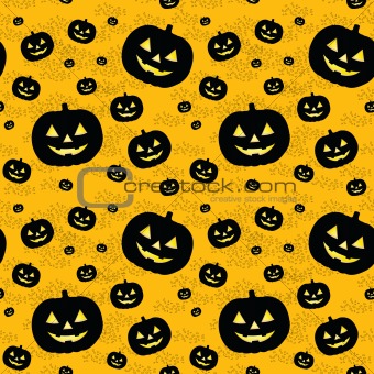 Seamless pattern with black pumpkins
