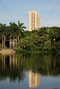 A building standing besides a lake