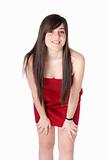 Young beautiful girl with red dress standing isolated on white background.