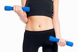 Unrecognizable young woman fitness exercise with dumbbells isolated on white background