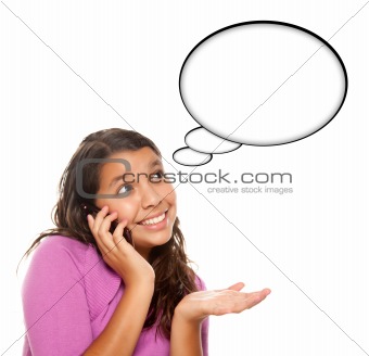Hispanic Teen Aged Girl on Cell Phone with Blank Thought Bubble Isolated on a White Background - Contains Clipping Paths.