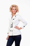young blond woman with glasses in white coat  - isolated on white