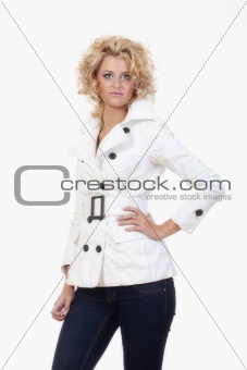 young blond woman with glasses in white coat  - isolated on white