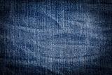 Wrinkled old blue jean background