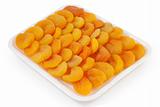 Dried apricots on a white plate