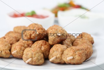 Meatballs with dips and salad
