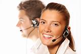 Young beautiful woman in a call center