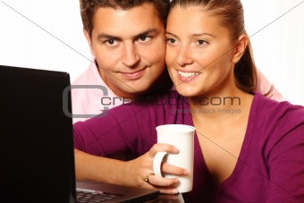 Young married couple browsing the Internet