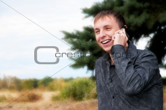 Young guy talking on cellphone