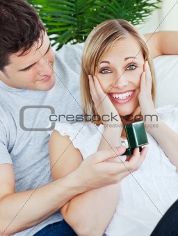 Woman surprised by her boyfriend presents 