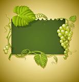 vintage frame with grapes and green leaves