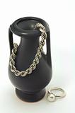 Vase, chain and ring