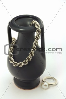 Vase, chain and ring