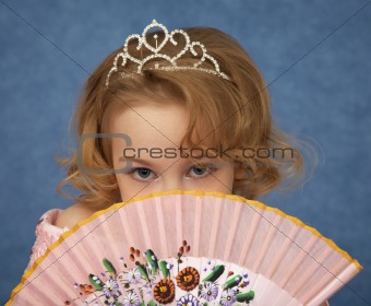 Portrait of young girl with Oriental fan