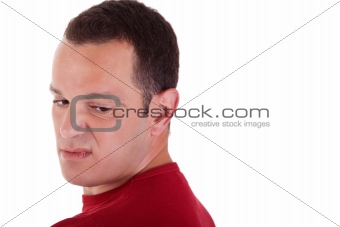 man to turn around, looking with contempt, isolated on white background. Studio shot.