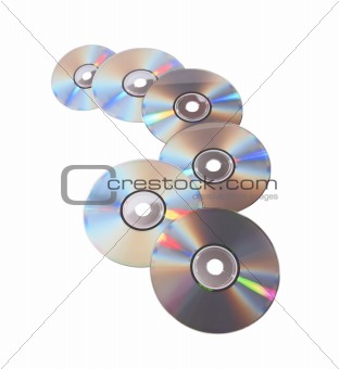 Many DVD diskes arranged at the white background