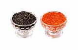 Red and black caviar isolated on white