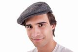 young man with a beret, isolated on white background. Studio shot.
