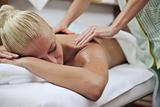 woman at spa and wellness back massage