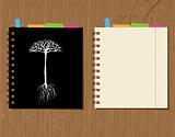 Notebook cover and page design on wooden background 