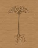 Art tree with roots on wooden background 