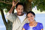 Happy African American Couple Together Under A Tree