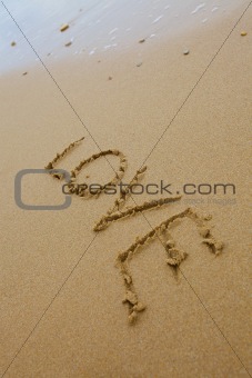 love inscription on the sand
