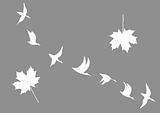 vector silhouettes of the cranes and maple leafs